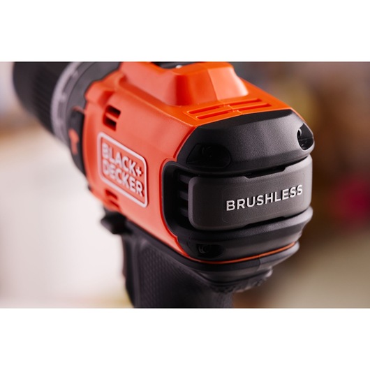 Close-up photo of BLACK+DECKER BLD683D1 brushless cordless drill in orange and black colors.