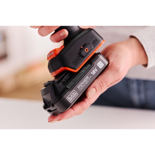 BLACKDECKER BLD683D1 lithium battery pack held in hand, showing 18V 2.0Ah POWERCONNECT label.