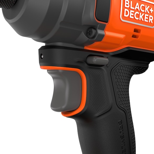 Close-up photo of BLACK+DECKER BLIM78N power tool handle with textured black grip, orange trim, and visible trigger.