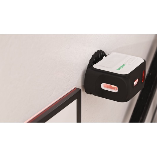 BLACKDECKER REVBDLL100 wall-mounted laser level in black and white, photo showing side angle.